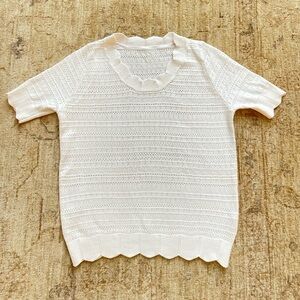 Pretty scalloped edged sweater size extra small.  White.